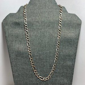 .925 Sterling Italy 20" Figaro Chain. 7mm. Weight is .91oz. (516)